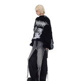 フラップ付き綿布のズボン