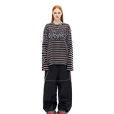 コーティングジップスリットジーンズ